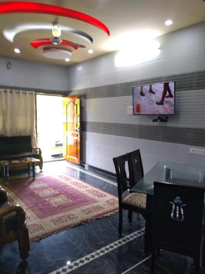 Yuga Guest House กุตตาลัม ภายนอก รูปภาพ