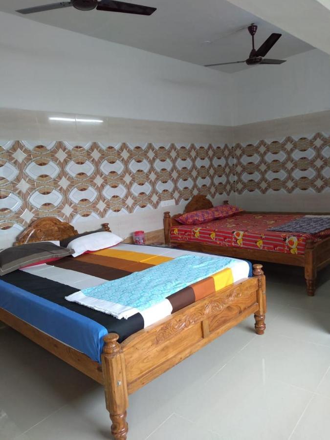 Yuga Guest House กุตตาลัม ภายนอก รูปภาพ
