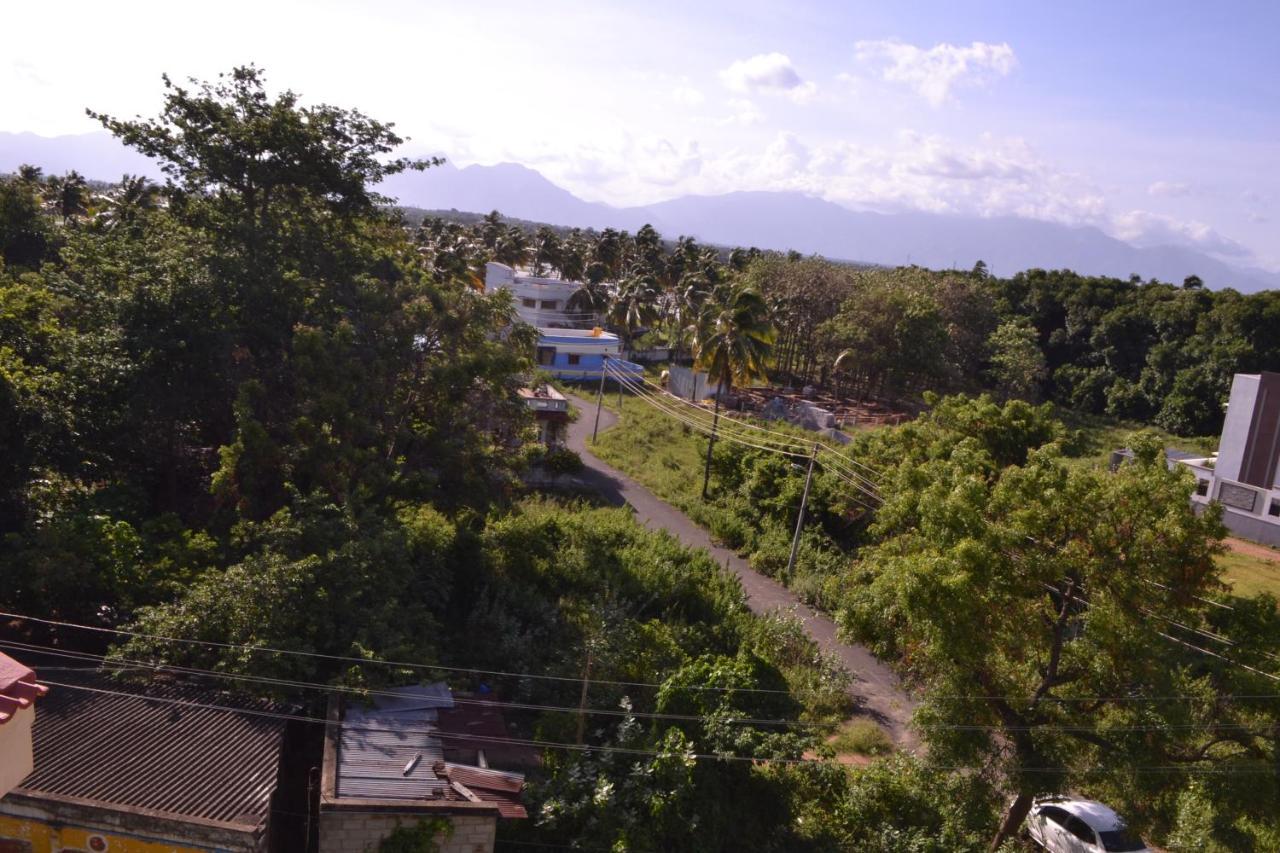 Yuga Guest House กุตตาลัม ภายนอก รูปภาพ