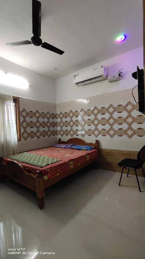 Yuga Guest House กุตตาลัม ภายนอก รูปภาพ